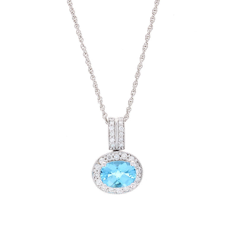 Ladies 14kt White Gold 1.43ct Blue Topaz and 0.26cts Diamond Pendant