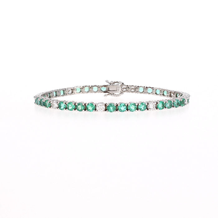 Ladies 14kt White Gold 6.77cts Emerald and 1.96cts Diamond Bracelet
