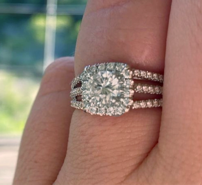 Close-up of a hand wearing a diamond ring